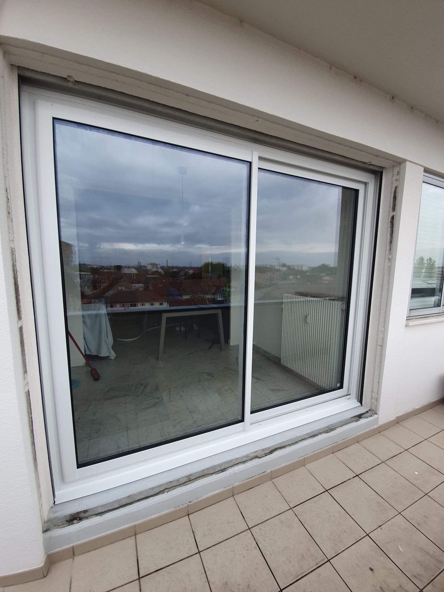 Baie vitrée aluminium coulissante installée à Mulhouse